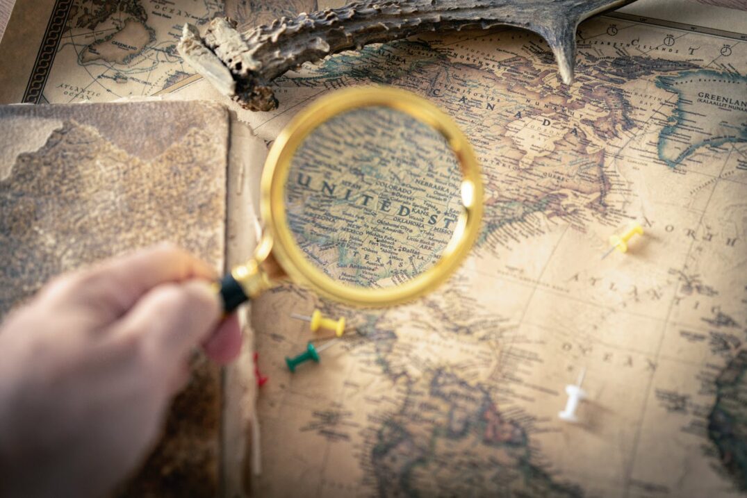 a magnifying glass pointed on a map